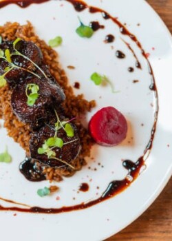 plate of food served on white tableware from a beautiful restaurant